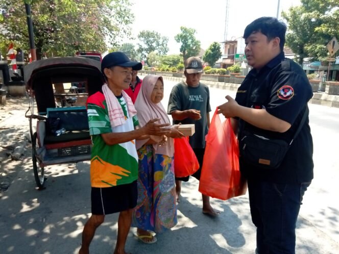 
					Kebaikan untuk Semua: Ormas 234 SC dan WPSP Bagikan Nasi Kotak